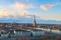 Turin skyline at sunset. Torino, Italy, panorama cityscape with the Mole Antonelliana over the city. Scenic colorful light and dra Royalty Free Stock Photo