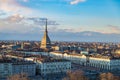 Turin skyline at sunset. Torino, Italy, panorama cityscape with the Mole Antonelliana over the city. Scenic colorful light and dra Royalty Free Stock Photo