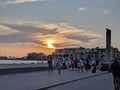 Turist walking and a beautiful sunset sky background