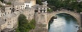 Tourists on the restored bridge of Mostar, Bosnia Royalty Free Stock Photo