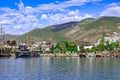 Alanya coastline with large tourist ships and boats in the water - view from the Mediterranean Royalty Free Stock Photo