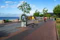 Alanya promenade - Ataturk Boulevard along Kleopatra Beach. Tourists stroll along the alley