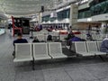 Lobby at Ankara Esenboga Airport. Tourists sit on metal seats in a large modern hall Royalty Free Stock Photo