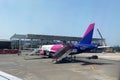 Turkey, Antalya - 11 11 2022: Airplane WizzAir in airport with many airplanes at beautiful sunny day, passenger airplane getting