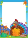 Turkey bird holding pumpkin frame 1 Royalty Free Stock Photo