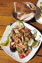 Turkey breast strips with mixed salad and feta cheese Royalty Free Stock Photo