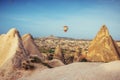 Turkey Cappadocia beautiful balloons flight stone landscape Royalty Free Stock Photo