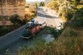 Turkey, Cappadocia, Goreme, June 12, 2017: Parts of hot air balloon is carried in trailer on the road between the Royalty Free Stock Photo