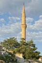 The minaret with its mosque in Mustafapasa, Turkey Royalty Free Stock Photo