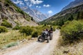 Turkey, Chamard - August 3, 2019: an elderly Turkish man drives an old tractor with a passenger on a road with a