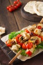 Turkey or chicken shish kebab skewers with mushrooms and pitas