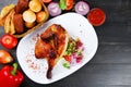turkey or chicken on wooden table and ingredients. Christmas or Thanksgivin table Royalty Free Stock Photo