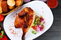 Turkey or chicken on wooden table and ingredients. Christmas or Thanksgivin table Royalty Free Stock Photo