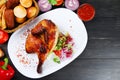 Turkey or chicken on wooden table and ingredients. Christmas or Thanksgivin table Royalty Free Stock Photo