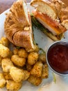 Turkey club sandwich with tater tots Royalty Free Stock Photo