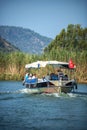 TURKEY, DALYAN, MUGLA - JULY 19, 2014: Touristic River Boats wit