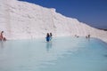 People relax at geothermal mineral water springs in Pamukkale, Turkey.