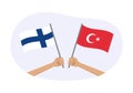 Turkey and Finland flags. Finnish and Turkish national symbols. Hand holding waving flag. Vector Royalty Free Stock Photo