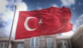 Turkey Flag 3D Rendering on Blue Sky Building Background Royalty Free Stock Photo