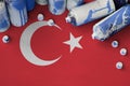 Turkey flag and few used aerosol spray cans for graffiti painting. Street art culture concept