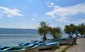 Turkey. Golyazi Lake, Bursa Turkey. Fisherman goes by boats to the fishing. Small boat hangs on the tree near the lake Royalty Free Stock Photo