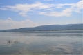 Turkey. Golyazi Lake, Bursa Turkey. Fisherman goes by boats to the fishing. Small boat hangs on the tree near the lake Royalty Free Stock Photo