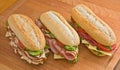 Turkey, ham and salami sandwiches Royalty Free Stock Photo