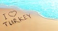 Turkey holidays concept. The inscription on the sand by the sea - I love Turkey Royalty Free Stock Photo