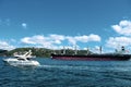 Turkey, Istanbul, Bosphorus Channel, Bosphorus Bridge, an cargo ship under the Bridge. Gate, nautical Royalty Free Stock Photo