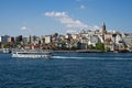 TURKEY, ISTANBUL - may, 2020. Panoramic view to Galata tower and ferry in Istanbul city scape with alld builsings around Royalty Free Stock Photo