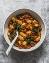 Turkey, kale cabbage, tomato sauce hash and potato gnocchi -  delicious mediterranean style lunch on a gray background, top view Royalty Free Stock Photo