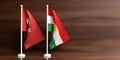 Turkey and Kurdistan relations. Small flags on wooden background. 3d illustration