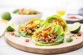 turkey lettuce wraps with avocado slices on top Royalty Free Stock Photo