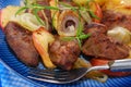 Turkey liver fried with onion and apple