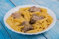 Turkey liver with pasta on a plate Royalty Free Stock Photo
