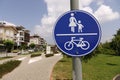 Turkey.Manavgat-June 2018. Cyclist & pedestrian road sign. Traffic in town.