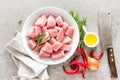 Turkey meat sliced and ingredients for cooking on light grey stone background Royalty Free Stock Photo