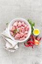 Turkey meat sliced and ingredients for cooking on light grey stone background Royalty Free Stock Photo