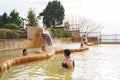 Turkey Pamukkale 08.03.2023 Senior aged elderly women, spa guests swim, treated in outdoor dirty hot springs. Rest