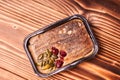 Turkey pate with pumpkin seeds and berries on a wooden table Royalty Free Stock Photo