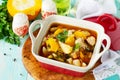 Turkey stew with pumpkin, vegetables and spices in a bowl on a wooden table in a rustic style. The concept thanksgiving food