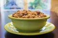 Turkey Stuffing in Green Bowl with Bokeh Background