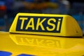 Turkey taxi called Taksi. Yellow taxi car roof sign