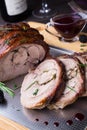 Turkey Thigh Roll Stuffed Rosemary, Thyme, Parsley, Butter and Bacon on the top with Spicy Blackberry Sauce Royalty Free Stock Photo