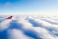 Turkish Airlines Logo on the Right Wing. View from Aircraft Window. Blue Horizon Above the Clouds in Atlantic Ocean. Traveling Fr