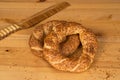 Turkish Bagel (Simit) with a bamboo knife Royalty Free Stock Photo