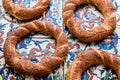 Turkish Bagel Simit on ottoman pattern surface. Royalty Free Stock Photo