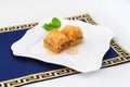 Turkish baklava, middle east sweets on white plate Royalty Free Stock Photo