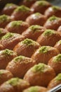 turkish baklava on a tray with nuts on top Royalty Free Stock Photo