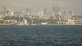 Sityscape from Bosphorus strait to the modern distruct of Istanbul with skyscrapers, Turkey. Video in 4K UHD, 3840